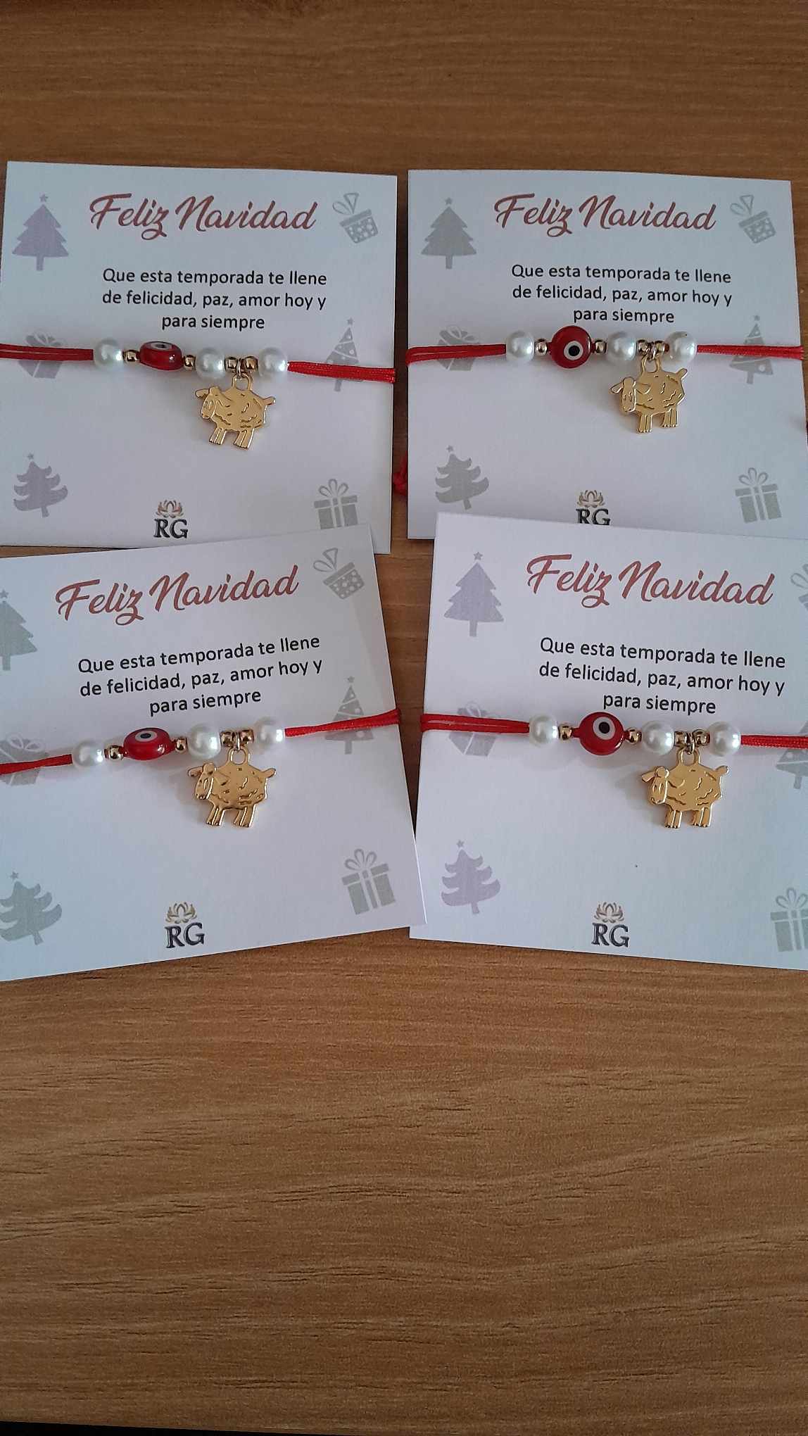 Pulsera de Hilo Rojo con Dije de Borreguito en Chapa de Oro y Ojo Turco