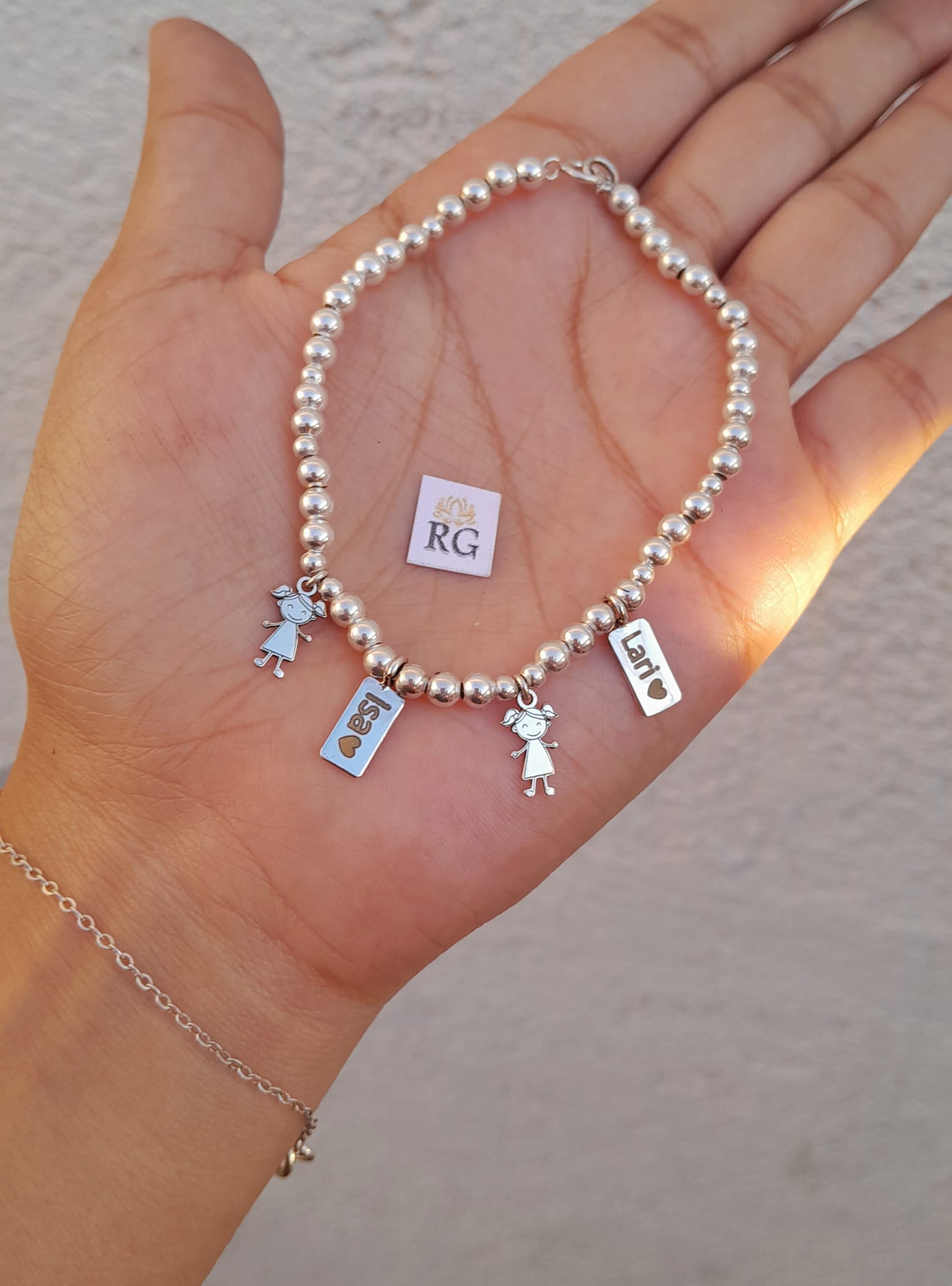 Pulsera de Bolitas con Dije de Niño(a) y Plaquita en Plata .950